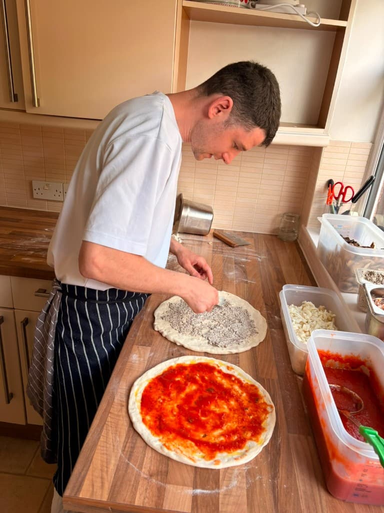 Making pizza in the kitchen